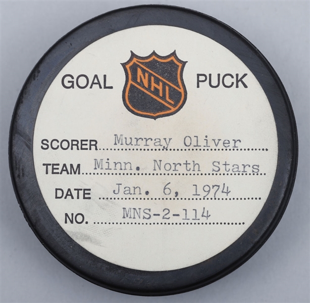 Murray Olivers Minnesota North Stars January 6th 1974 Goal Puck from the NHL Goal Puck Program - 7th Goal of Season / Career Goal #245 of 274
