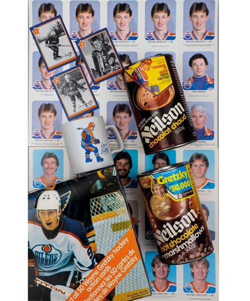 Wayne Gretzky 1982-83 Neilson Hot Chocolate Tins (2), Jerseys (2), Mug and 50-Card Set Plus 1981-1987 Edmonton Oilers Red Rooster Sheets (9) and More!