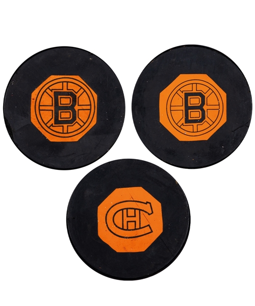 Boston Bruins and Montreal Canadiens 1962-64 "Original Six" Art Ross NHL Game Pucks (2) and Boston Bruins 1967-68 "Original Six" Art Ross NHL Game Puck