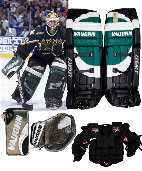 Ed Belfours 1999-2000 Dallas Stars Photo-Matched Game-Used Vaughn Glove and Blocker Plus Game-Used Vaughn Chest Protector, Game-Used Bauer Skates and Vaughn Game-Issued Pads with His Signed LOA