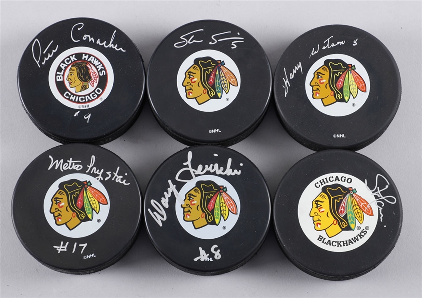 Chicago Black Hawks Signed Puck Collection of 20 Including Watson, Turner, Maloney, Lewicki, Sanford, Prystai, Sullivan, Ludzik and Others