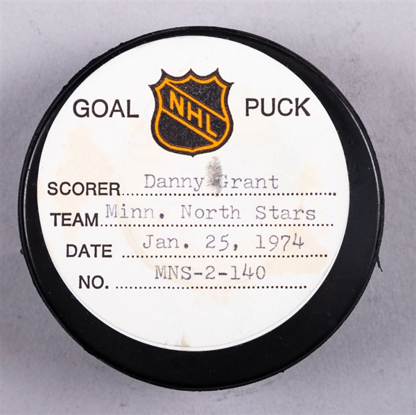Danny Grant’s Minnesota North Stars January 25th 1974 Goal Puck from the NHL Goal Puck Program - Season Goal #20 of 29 / Career Goal #170 of 263