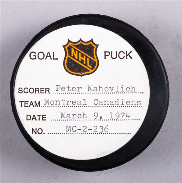 Peter Mahovlich’s Montreal Canadiens March 9th 1974 Goal Puck from the NHL Goal Puck Program - Season Goal #30 of 36 / Career Goal #139 of 288 - Assisted by Yvan Cournoyer