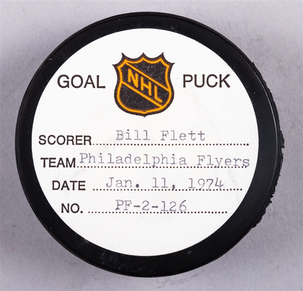 Bill Flett’s Philadelphia Flyers January 11th 1974 Goal Puck from the NHL Goal Puck Program - Season Goal #7 of 17 / Career Goal #145 of 202 - Game-Winning Goal - Assisted by Bobby Clarke