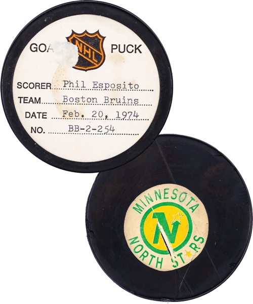 Phil Espositos Boston Bruins February 20th 1974 Goal Puck from the NHL Goal Puck Program - Season Goal #50 of 68 / Career Goal #448 of 717 - 3rd Goal of Hat Trick - Game-Tying Goal - Assisted by Orr