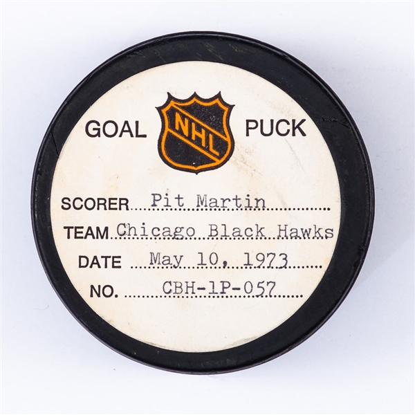 Pit Martins Chicago Black Hawks May 10th 1973 Playoff Goal Puck from the NHL Goal Puck Program - Season PO Goal #8 of 10 / Career PO #21 of 27 - 1st Goal of Hat Trick - Assisted by Stan Mikita