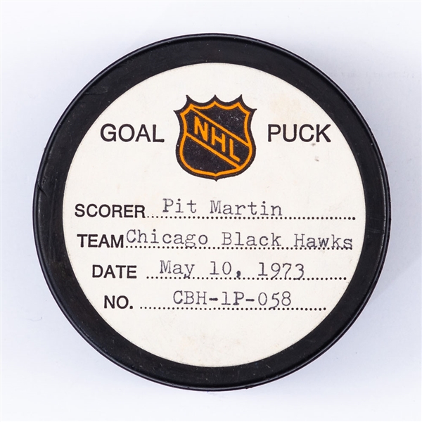 Pit Martins Chicago Black Hawks May 10th 1973 Playoff Goal Puck from the NHL Goal Puck Program - Season PO Goal #9 of 10 / Career PO #22 of 27 - 2nd Goal of Hat Trick - Power-Play Goal