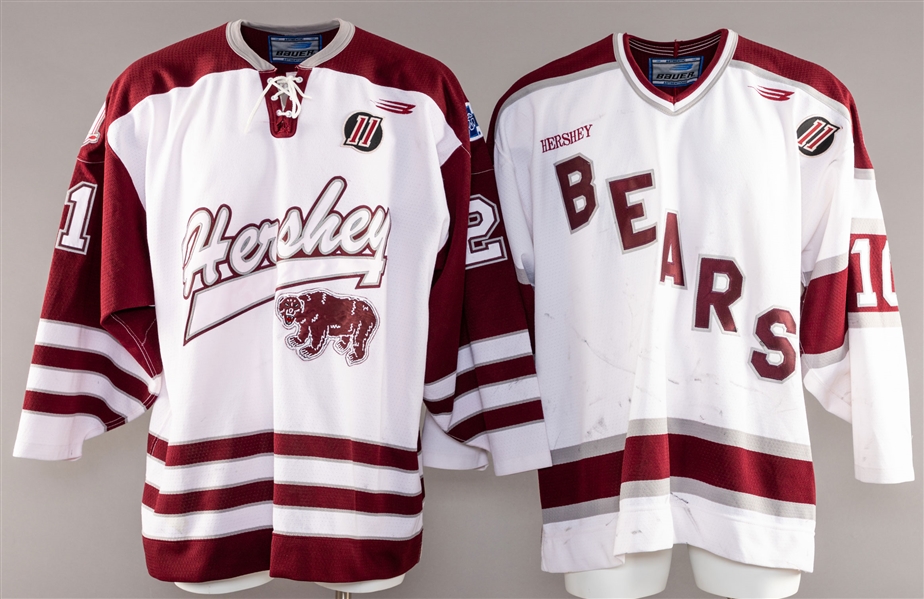 Hershey Bears Collection with Michael Gaul’s and Josef Marha’s 1997-98 Game-Worn Jerseys, Team-Signed Jersey Plus Stick, Team Jacket and Track Suit Top with LOA