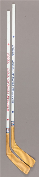 AHL 1996 All-Star Classic “Canadian All-Stars” and “American All-Stars” Team-Signed Sticks (2) Plus 1998 AHL All-Star Classic “Canadian All-Stars” Track Suit with LOA