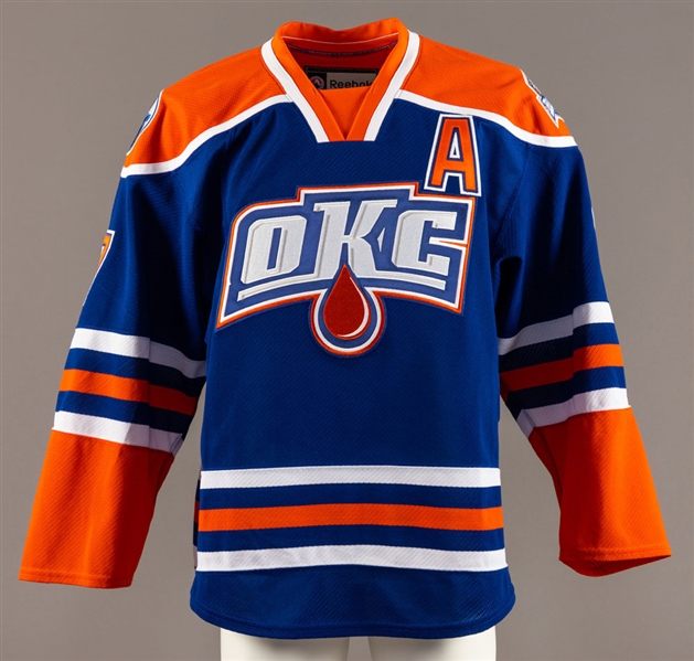 Jordan Eberle’s 2012-13 AHL Oklahoma Barons Signed Game-Worn Alternate Captain’s Jersey Plus Canvas Display with LOA