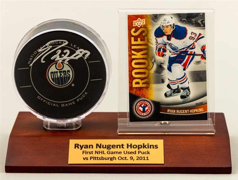 Ryan Nugent-Hopkins 2011-12 Edmonton Oilers Signed NHL Debut Game-Used Puck with Team LOA