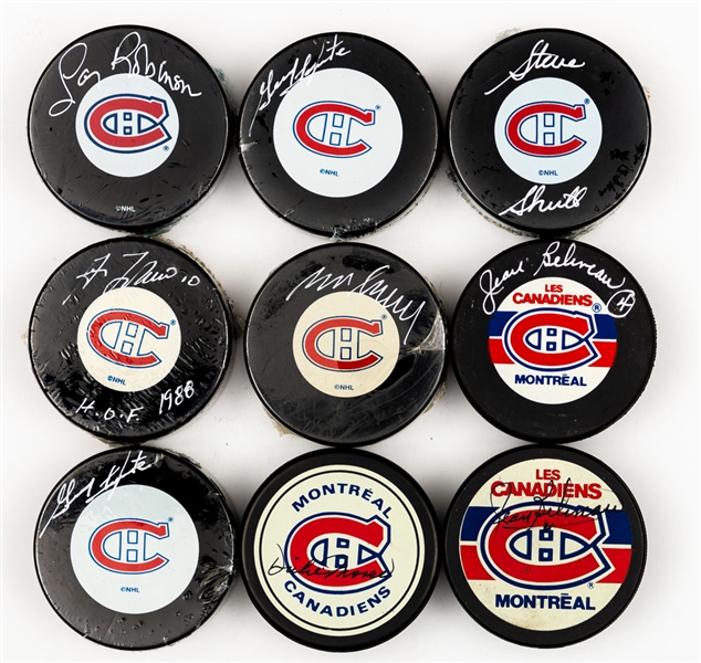 Lot of 25 Signed Hockey Pucks Including Guy Lafleur, Jean Beliveau and Other Hall of Famers