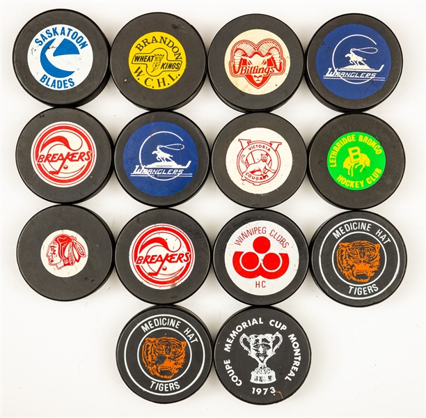 Collection of Vintage WHL and WCHL Pucks (29) Plus Programs (37)