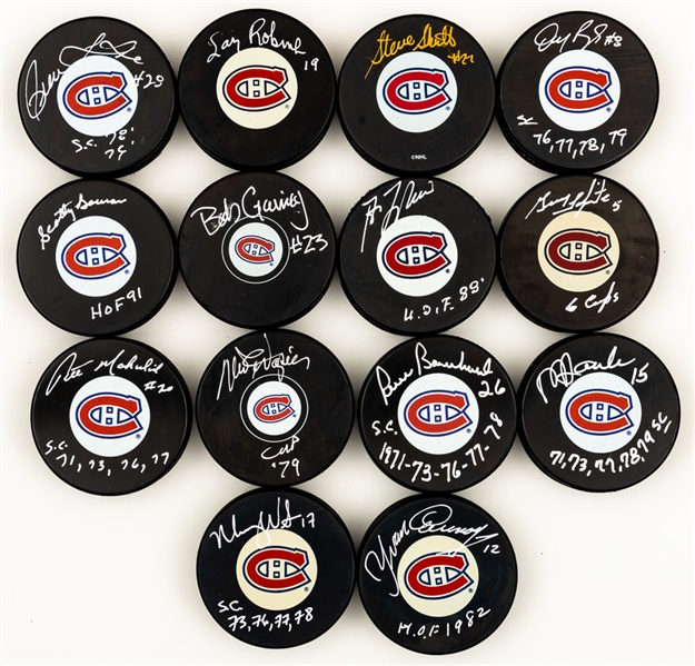 Montreal Canadiens 1970s Dynasty Single-Signed Puck Collection of 14 Including Bowman, Gainey, Lafleur, Shutt, Robinson, Cournoyer and Others with LOA