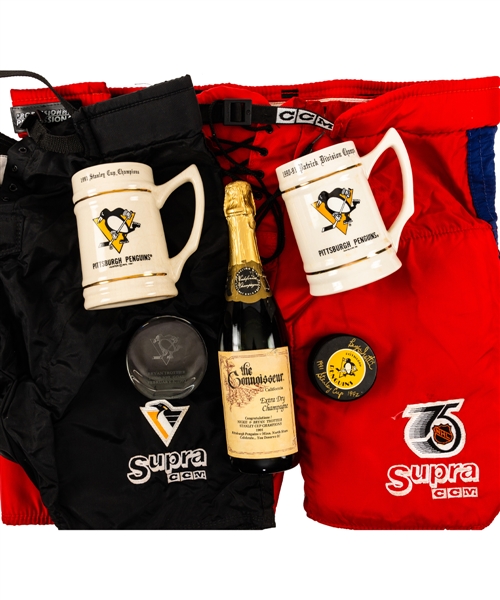 Bryan Trottiers Early-1990s Pittsburgh Penguins Stanley Cup Collection with Champagne Bottle, Stanley Cup Mugs, Awards, Photos and Signed Pucks from His Personal Collection with His Signed LOA