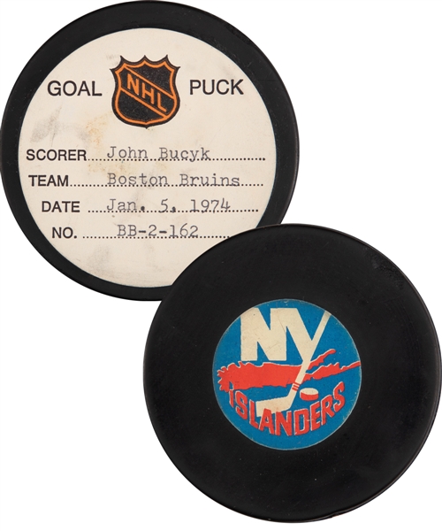Johnny Bucyks Boston Bruins January 5th 1974 Goal Puck from the NHL Goal Puck Program - Season Goal #11 of 31 / Career Goal #446 of 556 - 1st Goal of Hat Trick - Assisted by Esposito and Orr