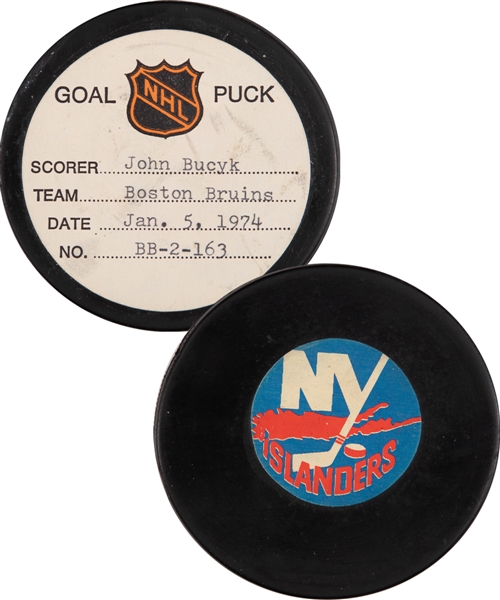 Johnny Bucyks Boston Bruins January 5th 1974 Goal Puck from the NHL Goal Puck Program - Season Goal #12 of 31 / Career Goal #447 of 556 - 2nd Goal of Hat Trick - Assisted by Esposito and Orr