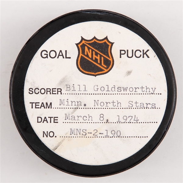 Bill Goldsworthys Minnesota North Stars March 8th 1974 Goal Puck from the NHL Goal Puck Program - Season Goal #36 of 48 / Career Goal #198 of 283