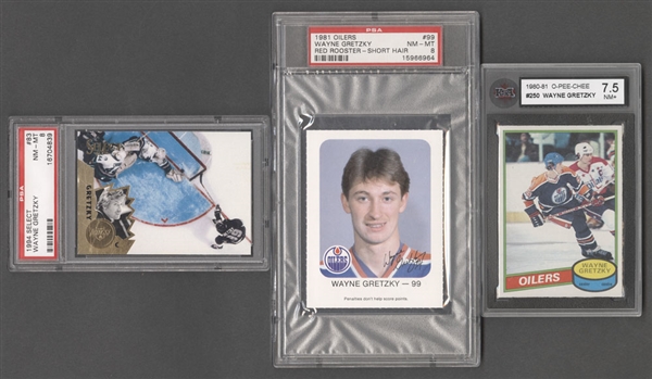 1980-81 O-Pee-Chee Hockey Card #250 HOFer Wayne Gretzky (Graded KSA 7.5), 1981 Oilers Reed Rooster (Short Hair - Graded PSA 8) and 1994-95 Select Hockey Card #83 (Graded PSA 8)