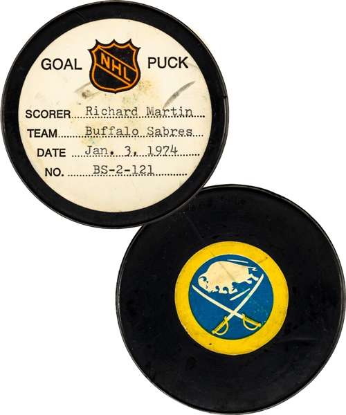 Richard Martins Buffalo Sabres January 3rd 1974 Goal Puck from the NHL Goal Puck Program - Season Goal #26 of 52 / Career Goal #107 of 384 - 1st Goal of Hat Trick - Assisted by Gil Perreault