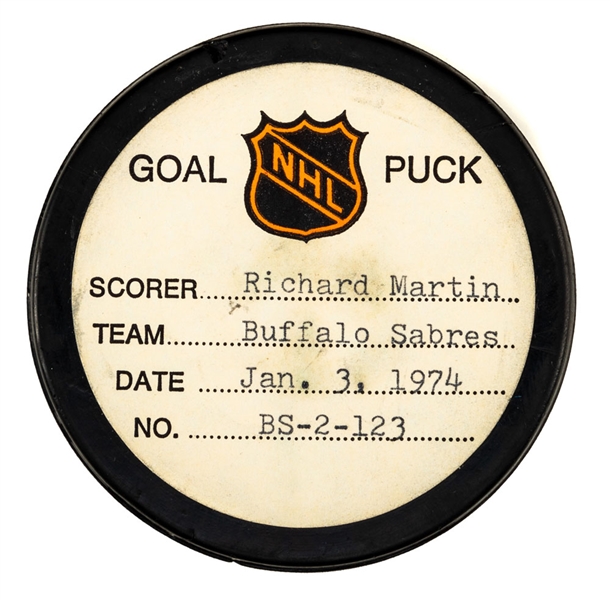 Richard Martins Buffalo Sabres January 3rd 1974 Goal Puck from the NHL Goal Puck Program - Season Goal #27 of 52 / Career Goal #108 of 384 - 2nd Goal of Hat Trick - Assisted by Gil Perreault