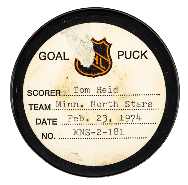 Tom Reids Minnesota North Stars February 23rd 1974 Goal Puck from the NHL Goal Puck Program - Season Goal #4 of 4 / Career Goal #15 of 17