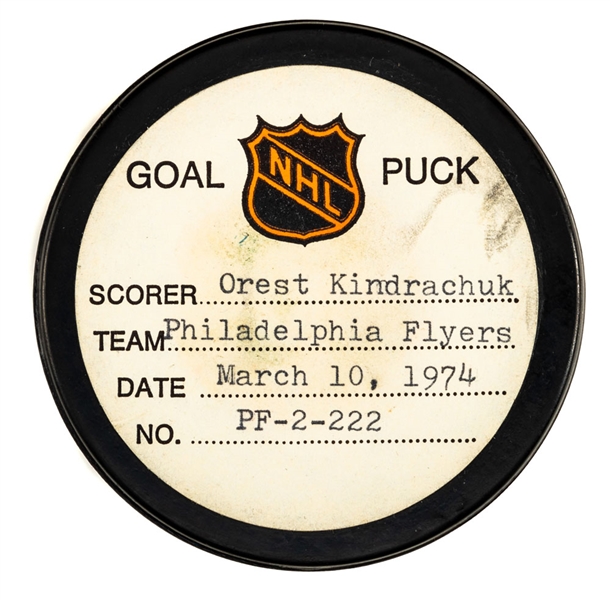 Orest Kindrachuks Philadelphia Flyers March 10th 1974 Goal Puck from the NHL Goal Puck Program - Season Goal #9 of 11 / Career Goal #11 of 118 - Game-Winning Goal