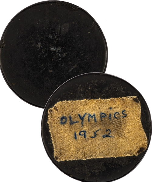 1952 Oslo Winter Olympics Game-Used Puck from the Ralph Hansch Personal Collection with Family LOA 