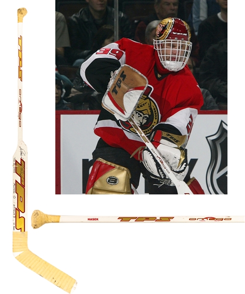 Dominik Haseks 2005-06 Ottawa Senators Signed TPS Omega Game-Used Stick - Attributed to his 68th Career Shutout on Jan 26, 2006! 