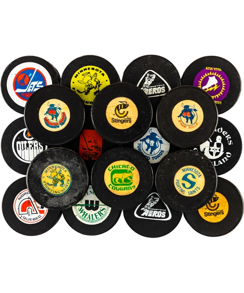 WHA 1972-77 Biltrite, Art Ross, CCM and Viceroy Game Puck Collection of 35