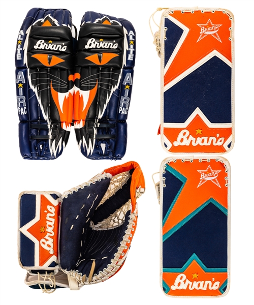 Felix Potvins 1999-2000 New York Islanders Brians Game-Issued Pads and Blocker, Brians Worn Glove and Additional Brians Blocker from His Personal Collection with His Signed LOA 