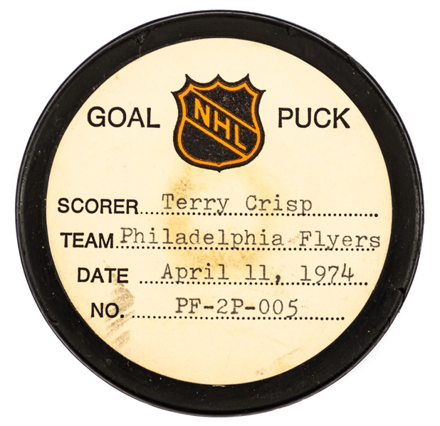 Terry Crisp’s Philadelphia Flyers April 11th 1974 Playoff Goal Puck from the NHL Goal Puck Program - Season PO Goal #1 of 2 / Career PO Goal #12 of 15 