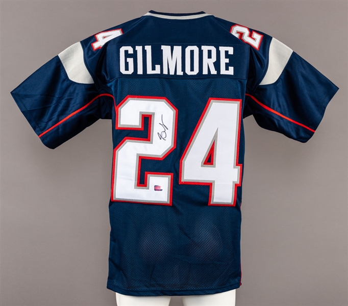 Stephon Gilmore Signed New England Patriots Jersey and Riddell Mini Helmet with COA