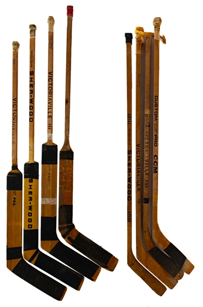 Early-1970s Game Stick Collection of 7 Including Plante, Hull, Savard, Lemaire, Vachon, Tallon and Binkley