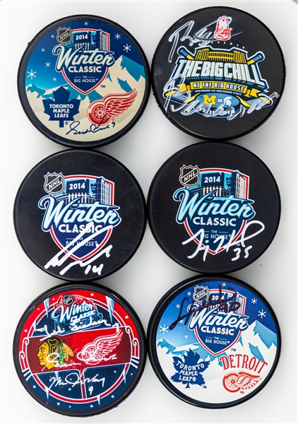Detroit Red Wings 2009 (2) and 2014 (15) Winter Classic Signed Puck Collection of 17 