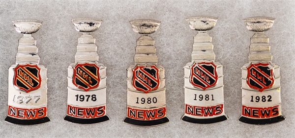 1973 NHL All-Star Game Press Pin and Program, 1977-82 Stanley Cup Press Pins (5) and 1979 Challenge Cup Press Pass, Press Box Ticket Stub, Pin and Program