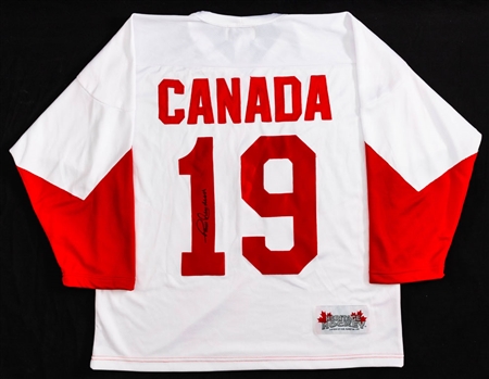 Paul Henderson Signed 1972 Canada-Russia Series Team Canada Jersey (with COA) Plus Team of the Century Roots Leather Bag and Team Canada Book