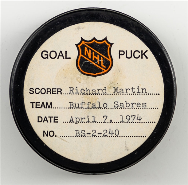 Richard Martins Buffalo Sabres April 7th 1974 Goal Puck from the NHL Goal Puck Program - Season Goal #51 of 52 / Career Goal #132 of 384 - 2nd Goal of Hat Trick - Game-Winning Goal