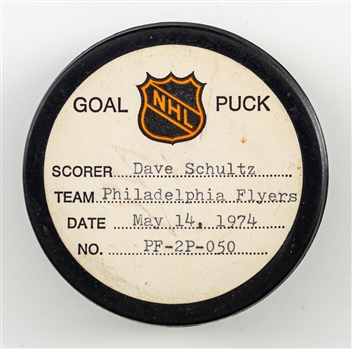 Dave Schultzs Philadelphia Flyers May 14th 1974 Playoff Goal Puck from the NHL Goal Puck Program - Season PO Goal #2 of 2 / Career PO Goal #3 of 8