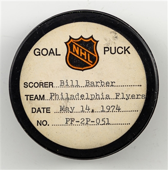 Bill Barbers Philadelphia Flyers May 14th 1974 Playoff Goal Puck from the NHL Goal Puck Program - Season PO Goal #3 of 3 / Career PO Goal #6 of 53 - Game-Winning Goal 