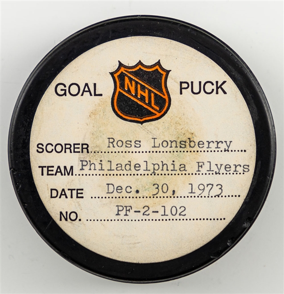 Ross Lonsberrys Philadelphia Flyers December 30th 1973 Goal Puck from the NHL Goal Puck Program - Season Goal #13 of 32 / Career Goal #97 of 256