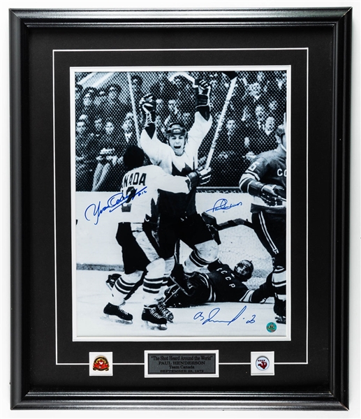 "The Shot Heard Around the World" 1972 Canada-Russia Series Henderson, Tretiak and Cournoyer Multi-Signed Framed Photo Display with LOA (25” x 29 ½”) 