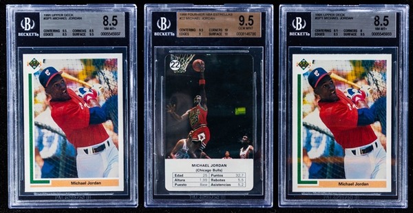 1991 Upper Deck Baseball Card #SP1 Michael Jordan (Two - Both Graded Beckett 8.5) and 1988 Fournier NBA Estrellas Basketball Card #22 Michael Jordan (Graded Beckett 9.5)