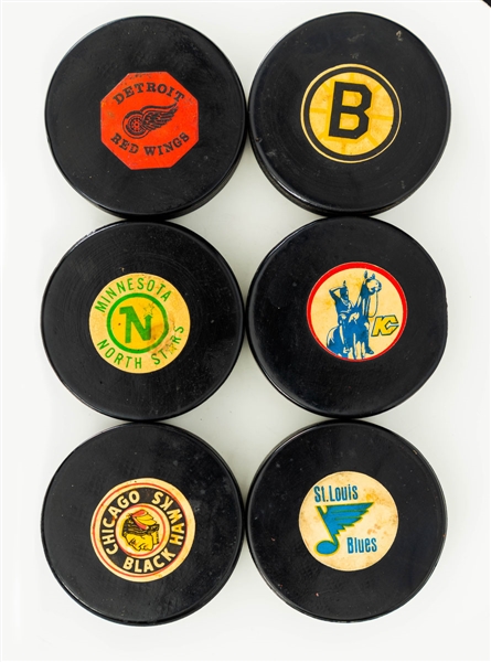 NHL 1969-77 Art Ross/Converse (Screened Reverse) Game Puck Collection of 25