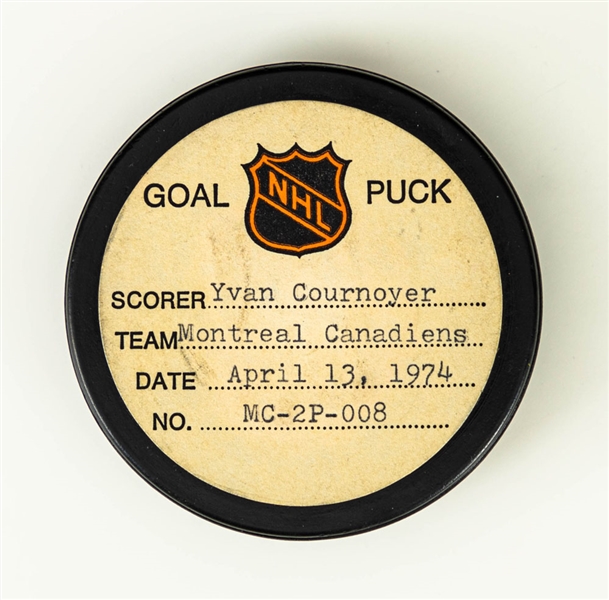 Yvan Cournoyer’s Montreal Canadiens April 13th 1974 Playoff Goal Puck from the NHL Goal Puck Program - 4th Playoff Goal of Season / Career Playoff Goal #48 of 64