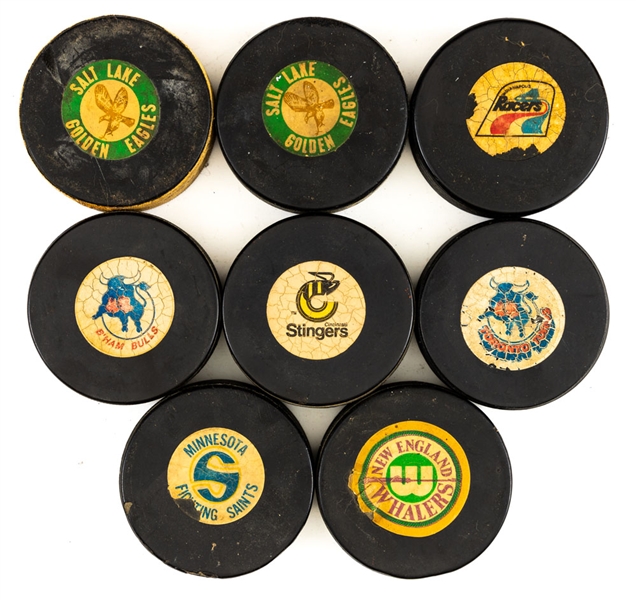WHA 1972-79 Biltrite, Art Ross, CCM and Viceroy Game Puck and Souvenir Puck Collection of 15