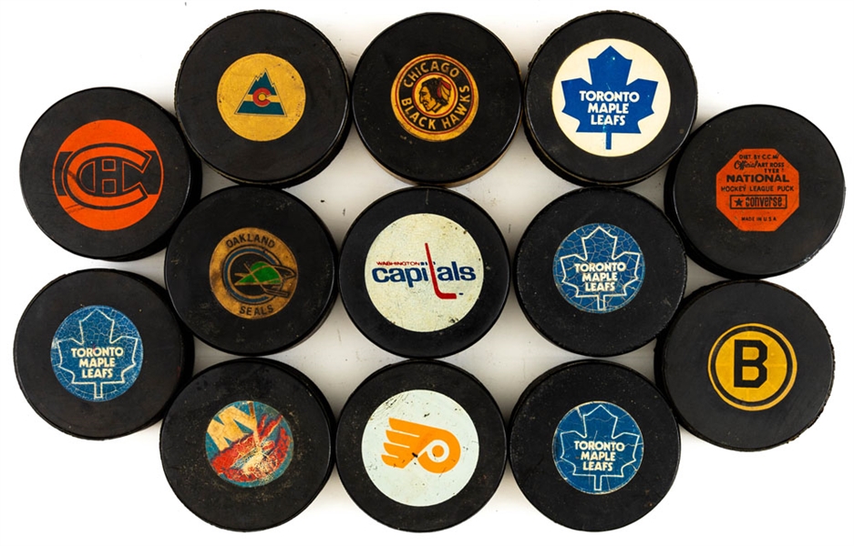 NHL and Minor League Game Puck and Souvenir Puck Collection of 71 Including 1969-77 NHL Art Ross/Converse (2), NHL 1973-83 Viceroy (7), NHL 1977-82 Viceroy (1) and Others