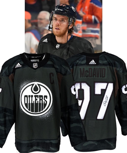 Connor McDavid’s 2019-20 Edmonton Oilers Signed Warm-Up Worn Canadian Armed Forces Camouflage Captain’s Jersey Plus 2019-20 Game-Worn Uniform Socks with Team LOAs 