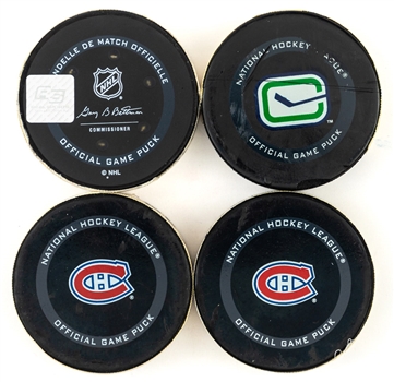 Nick Suzuki 2020-21 Montreal Canadiens Goal Pucks with COAs (12) Including Regular Season and Playoffs - Includes First and Last Goals of Regular Season and First Goal of Playoffs