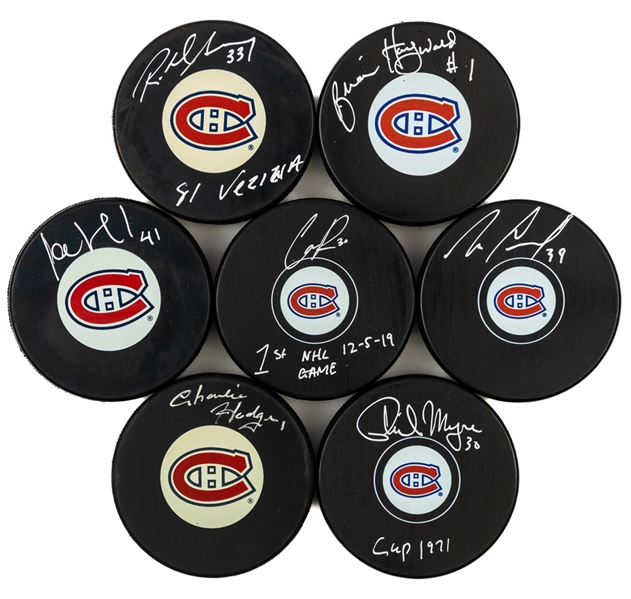 Montreal Canadiens Goalies Signed Puck Collection of 7 Including Hodge, Myre, Sevigny, Hayward, Thibault, Condon and Primeau with LOA